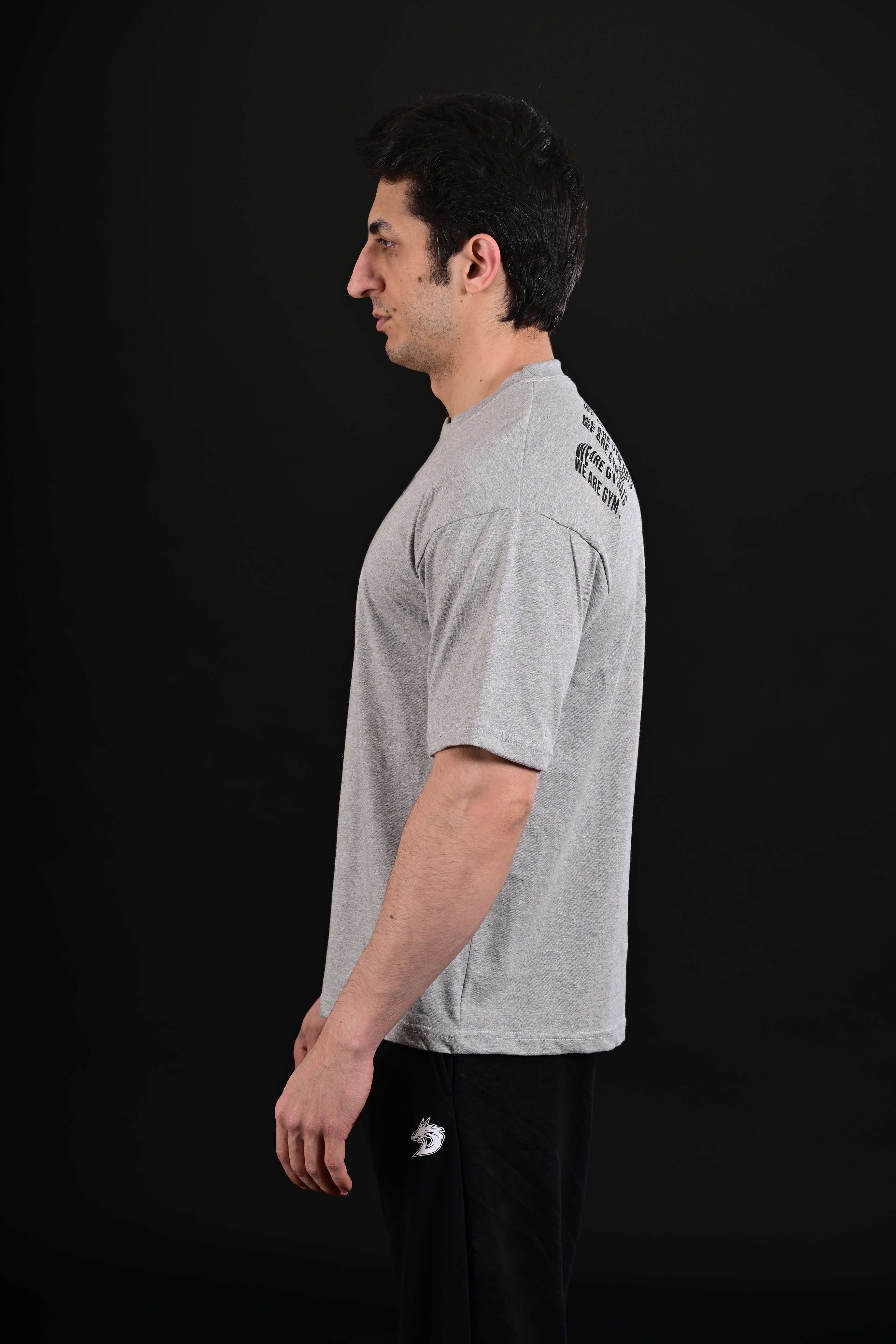 Men wearing Pump Cover Drop Shoulder Grey Gym T Shirt Pakistan
