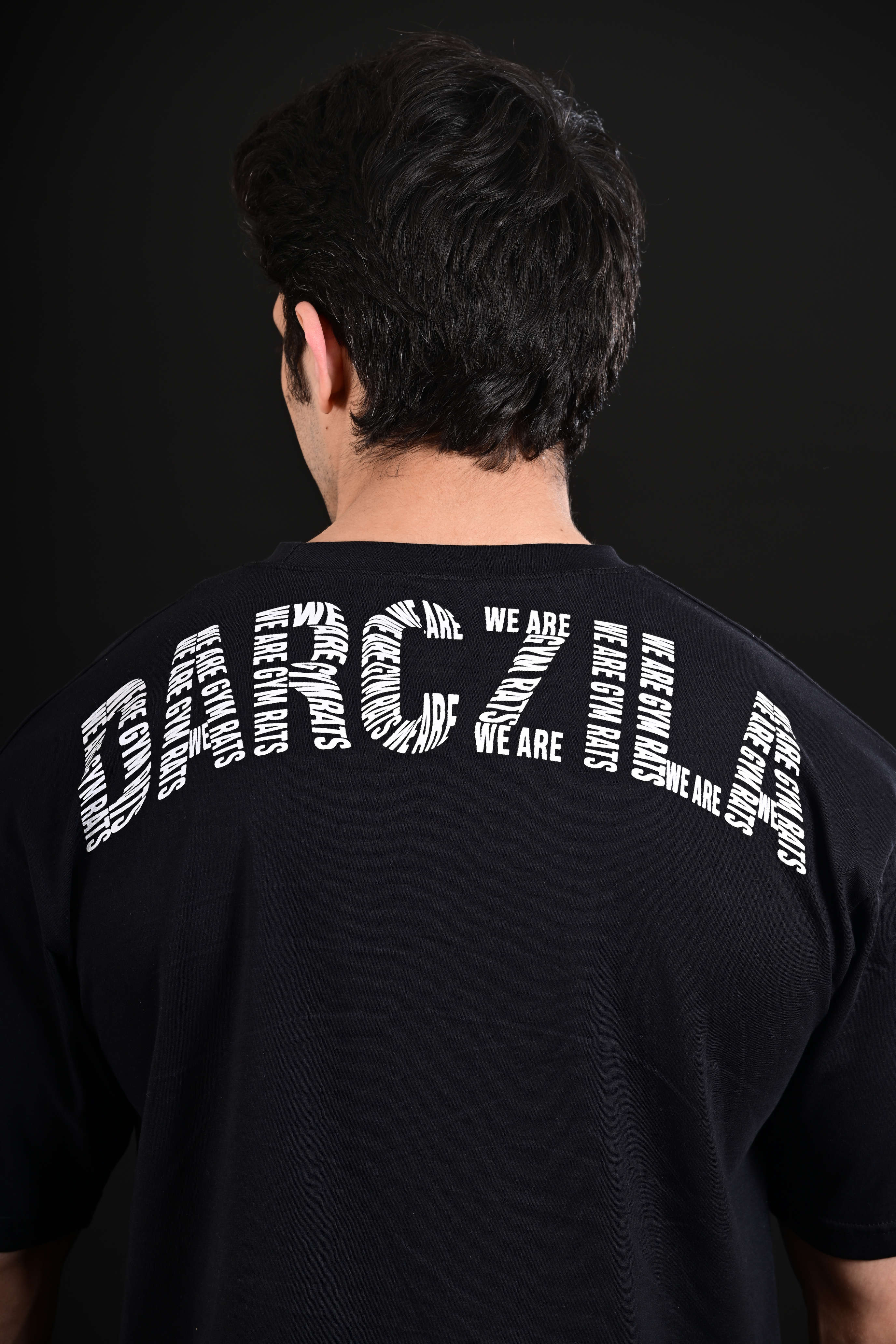 Men wearing Pump Cover Drop Shoulder Black Gym T Shirt Pakistan
