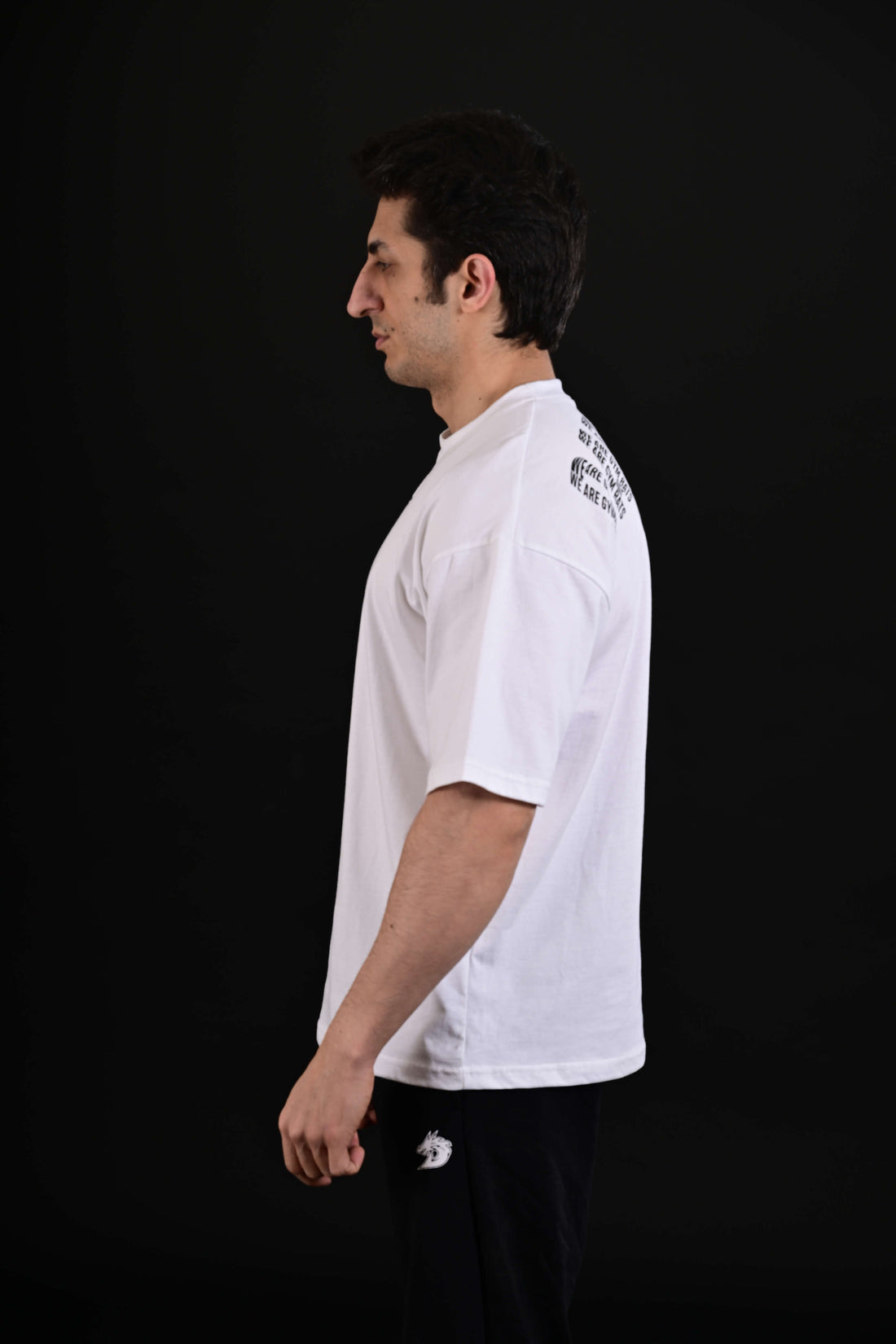 Men wearing Pump Cover Drop Shoulder White Gym T Shirt Pakistan

