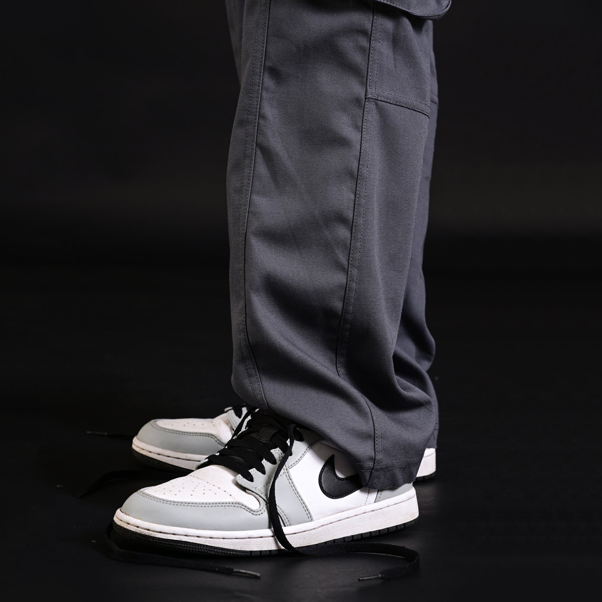 Grey cargo pants for gym wear, comfortable and durable men's workout pants with multiple pockets, ideal for fitness training, exercises, and active gym sessions