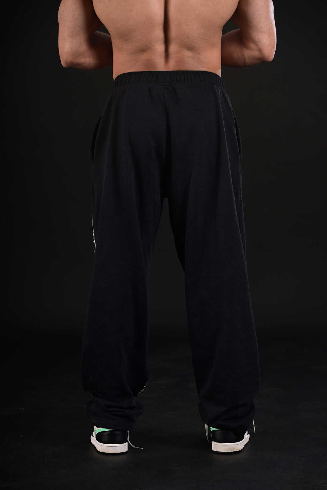 Women wearing black flare bottom activewear Pakistan
