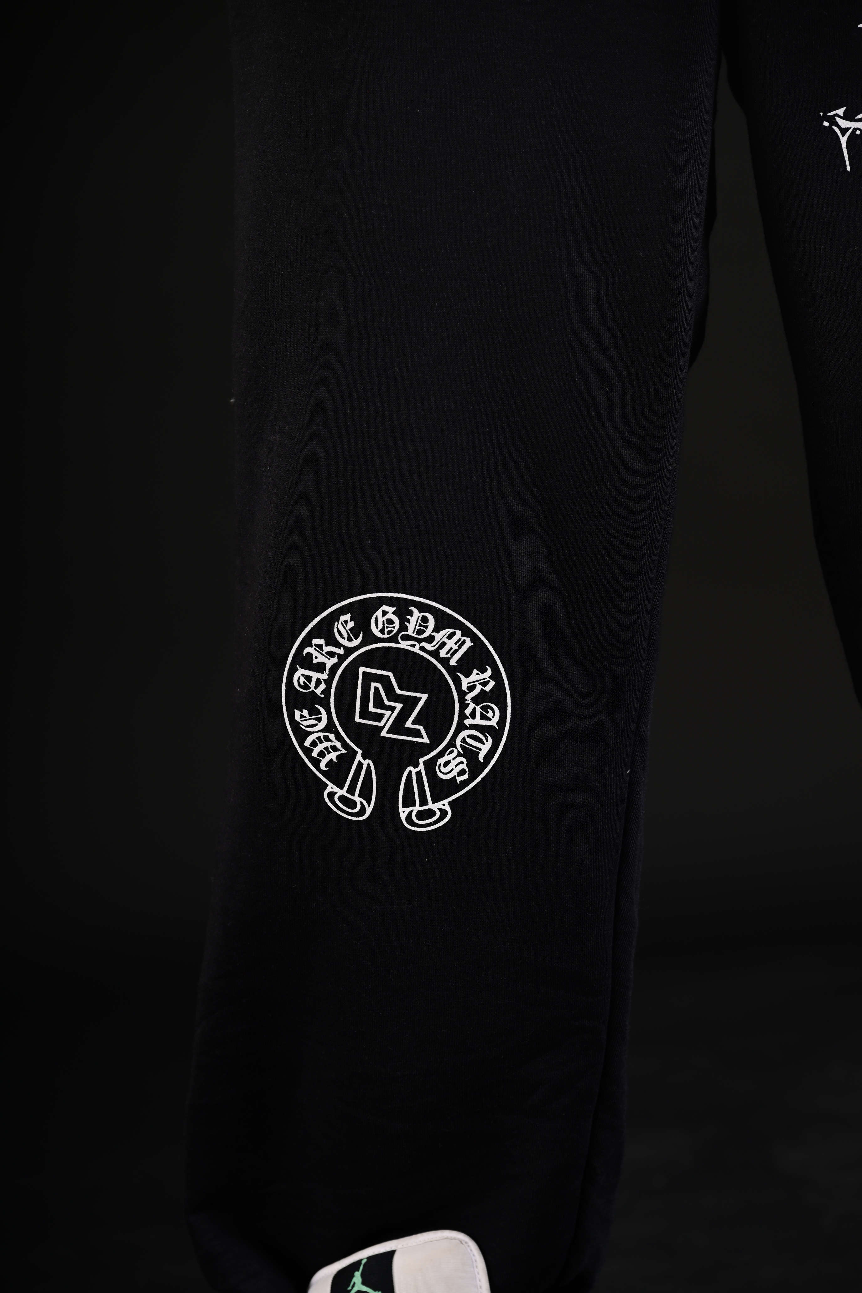 Exclusive black flare bottom fabric close up Pakistan