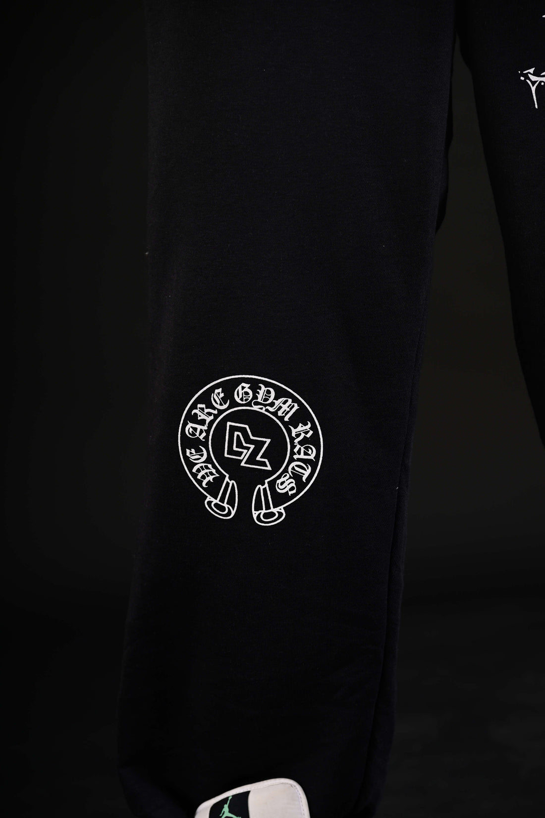 Exclusive black flare bottom fabric close up Pakistan