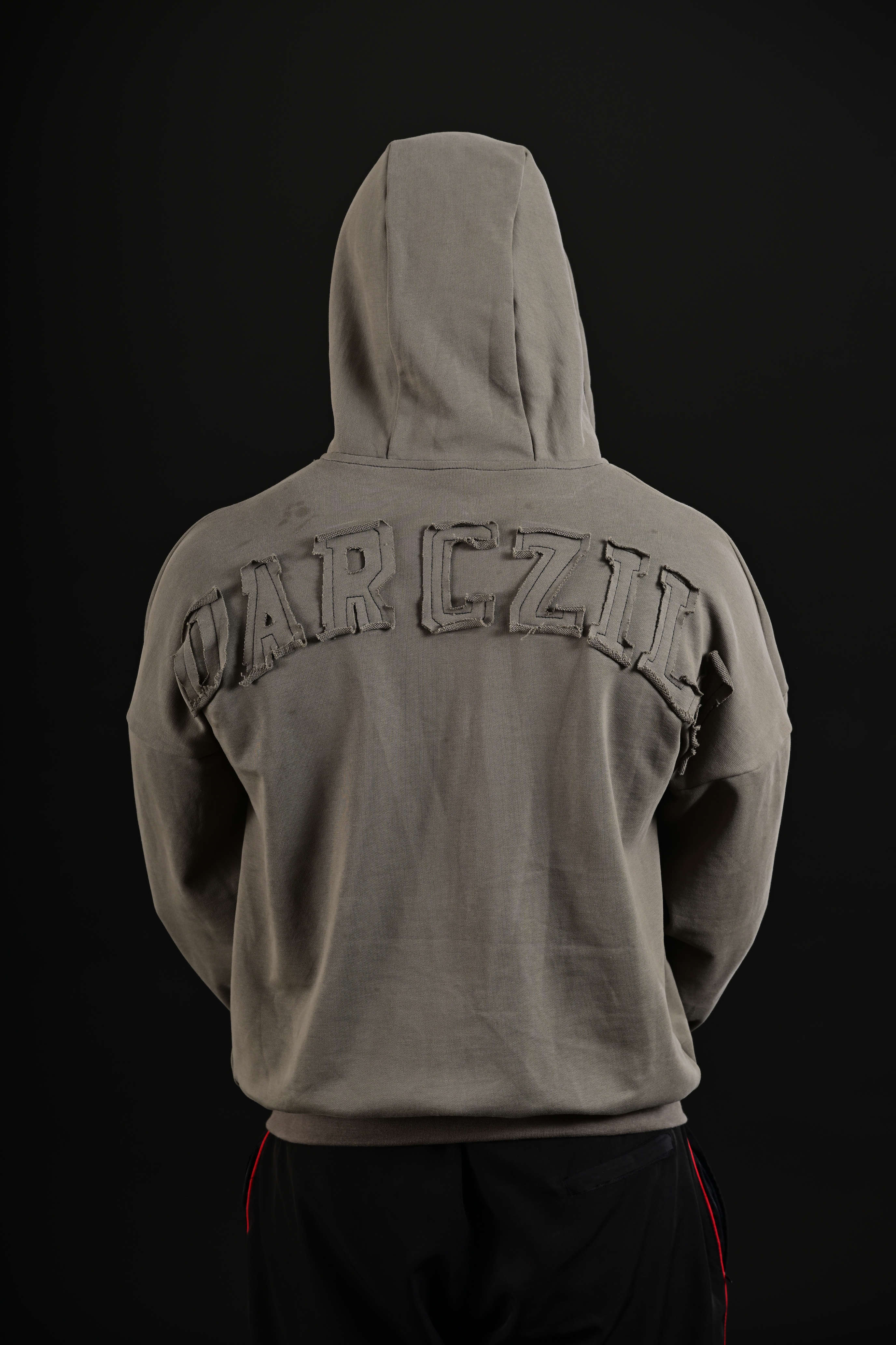 Men wearing olive drop shoulder hoodie Pakistan