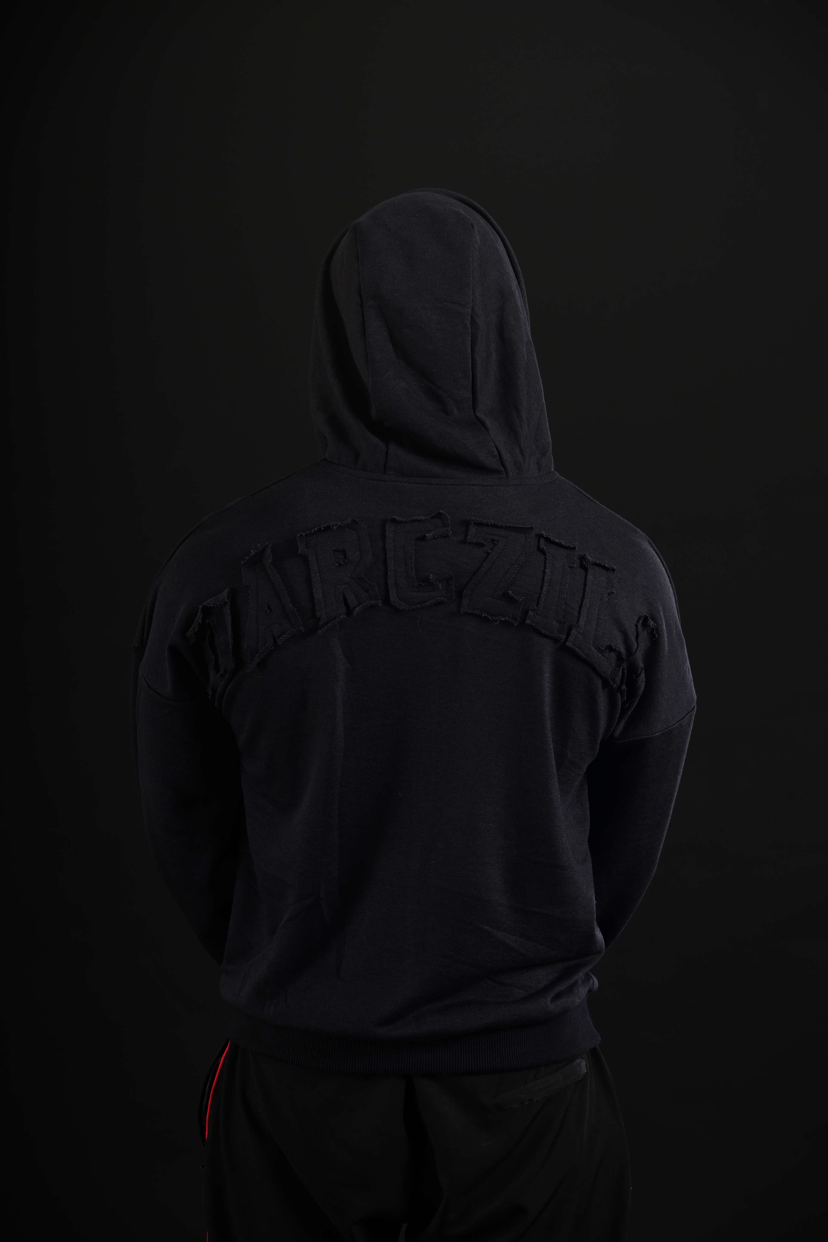 Men wearing black drop shoulder hoodie Pakistan

