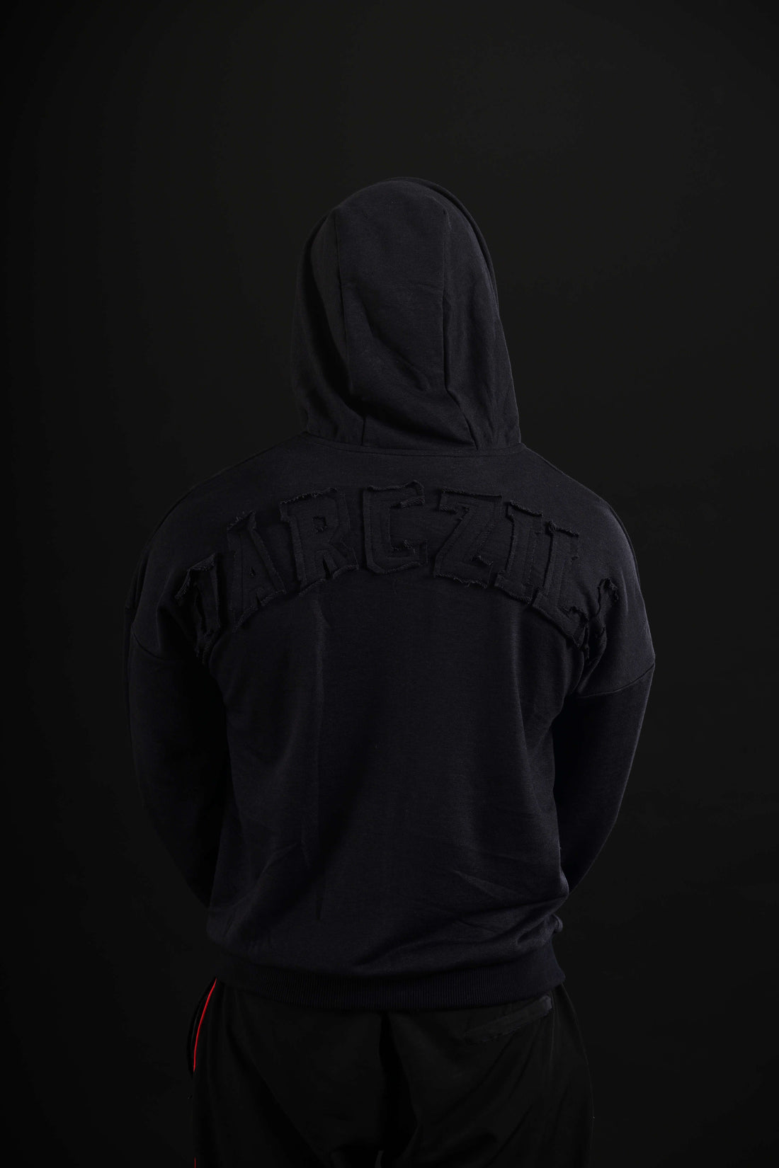 Men wearing black drop shoulder hoodie Pakistan
